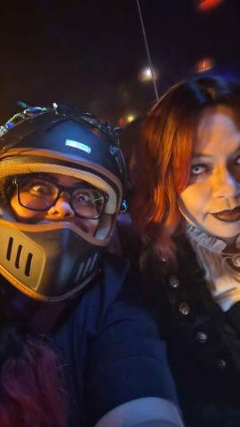 Sian (left) and Marie (right) dressed in Halloween outfits - a biker and a vampire respectively.